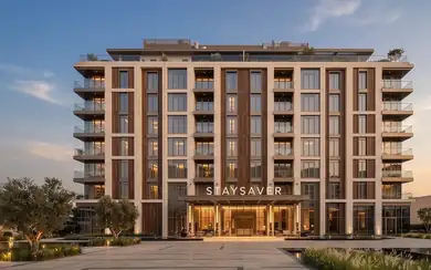 Hotel facade with a paved forecourt